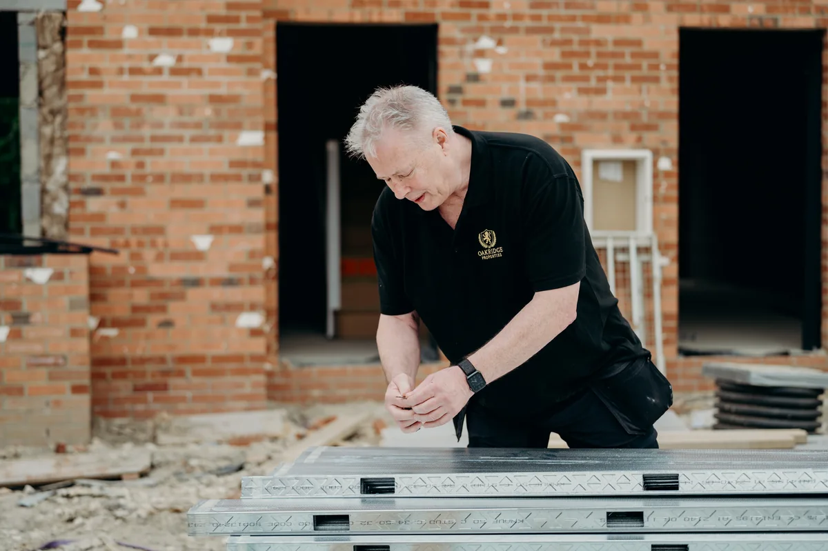 Mike working with construction materials on site